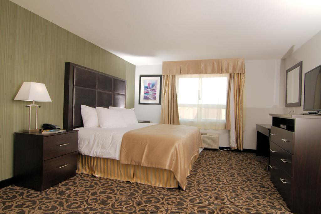 Paradise Inn And Suites Redwater Zimmer foto